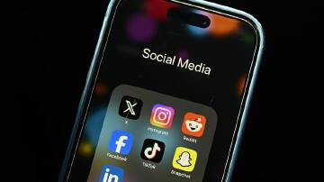 Most social media platforms require users to be at least 13 but the age limit is easily circumvented (Joel Carrett/AAP PHOTOS)