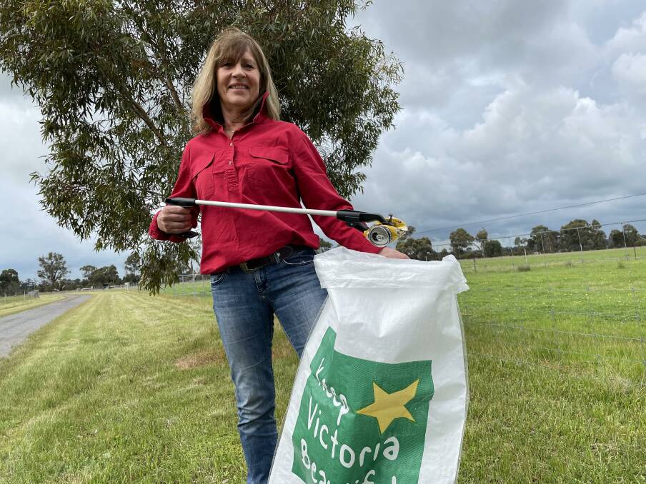 VOLUNTEER: Penni Iredell said she has filled more than 60 bags of rubbish in the three months since she started cleaning the highway. Picture: ALEX DALZIEL