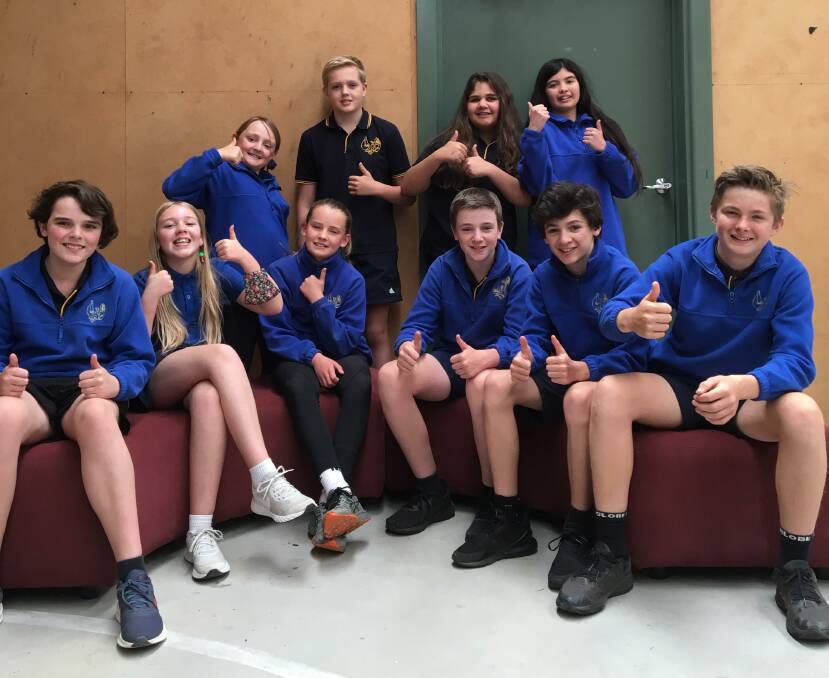 LOOKING COOL: Halls Gap primary students pose under one of the new split systems. Picture: CONTRIBUTED