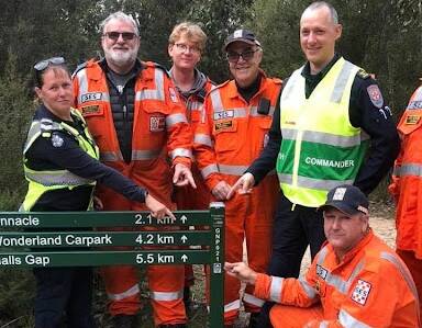 Volunteers from Stawell VICSES Unit, Victoria Police and Ambulance Victoria assist to raise tourist awareness of the bush walking emergency markers. 