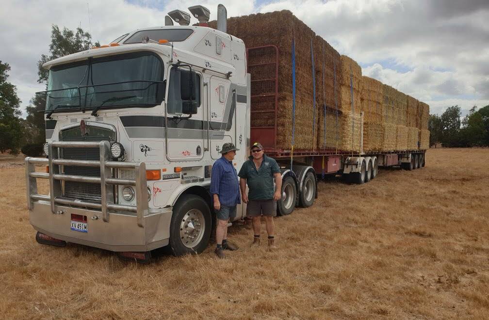 Nick Watson and Mike McMurtrie with a truckload of mateship for the Pomonal farmers. Picture supplied.