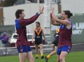 Jordan Motton celebrates with Brody Pop after the first goal of the round 14 WFNL match against Nhill at City Oval on Saturday, July 27. Picture by Lucas Holmes