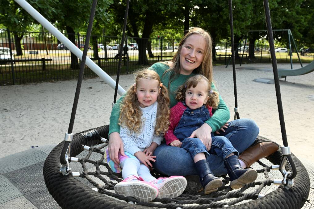 Rebekah Fisher with daughters Avril, age four, and Zoe, two, who are hoping Grampians Health gets it Christmas wish to boost paediatric at-home care so they can spend more time at home as a family. Picture by Lachlan Bence