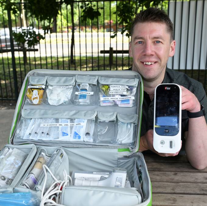 Grampians Health paediatric navigator Matthew Drake with his at-home care kit with the basics to help young families. Picture by Lachlan Bence
